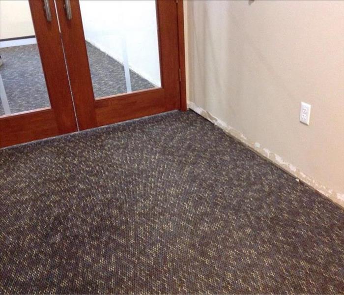Dried carpet with base boards taken off
