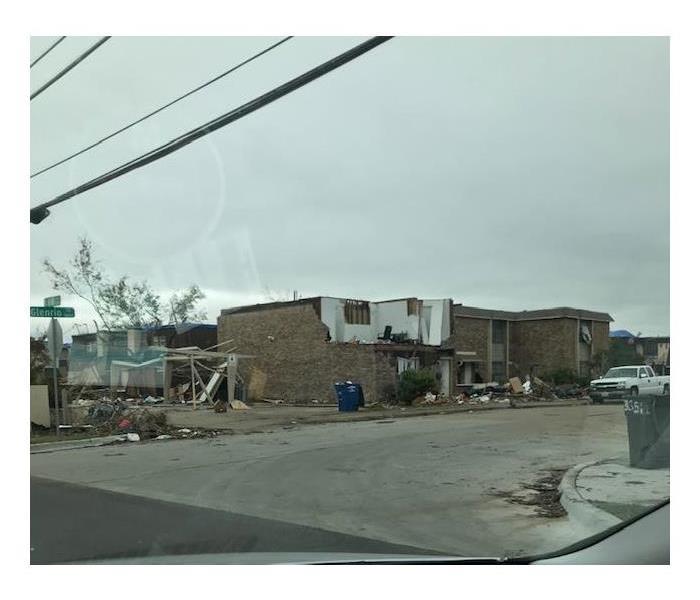 building torn apart by recent tornado