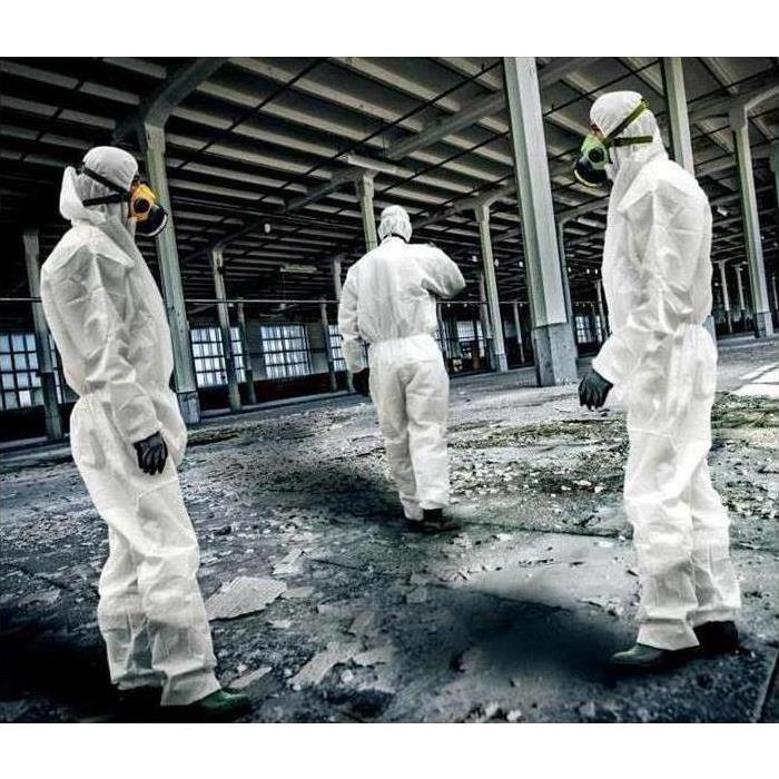 3 technicians removing asbestos