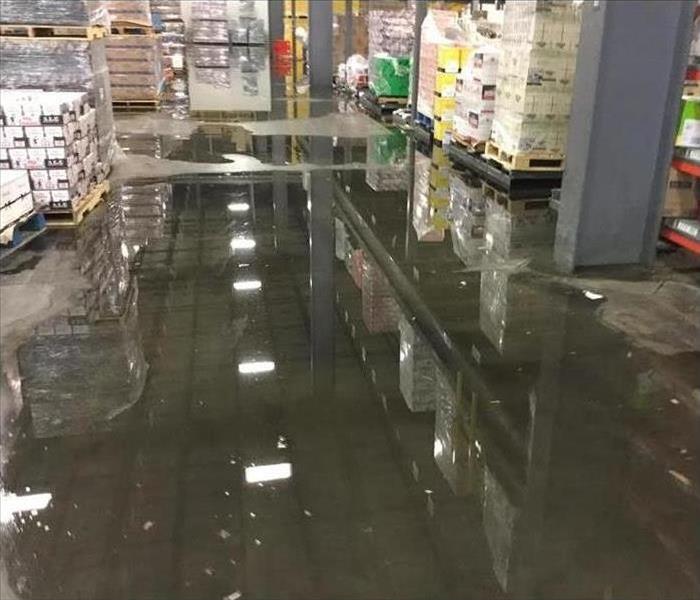 Distribution center that has standing water on the floor.